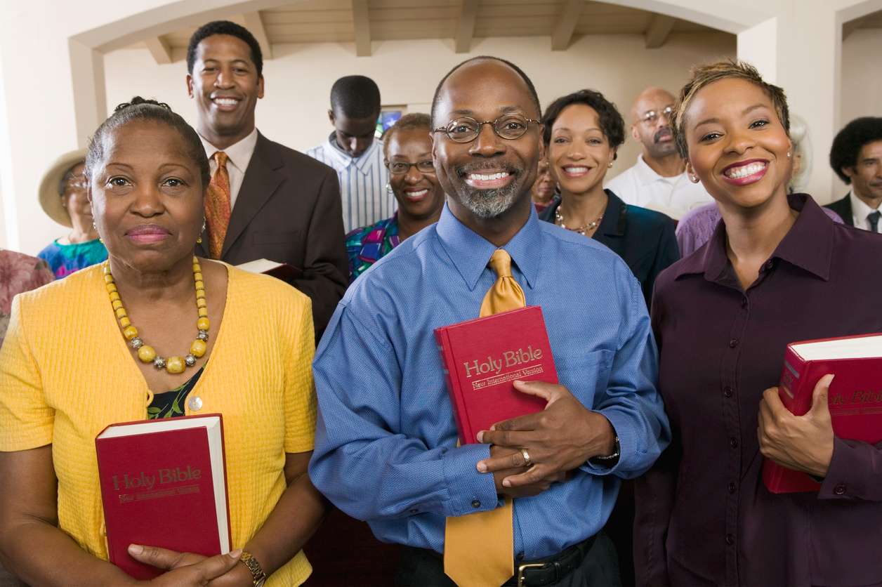 Sunday service congregation standing in church with bibles portrait
